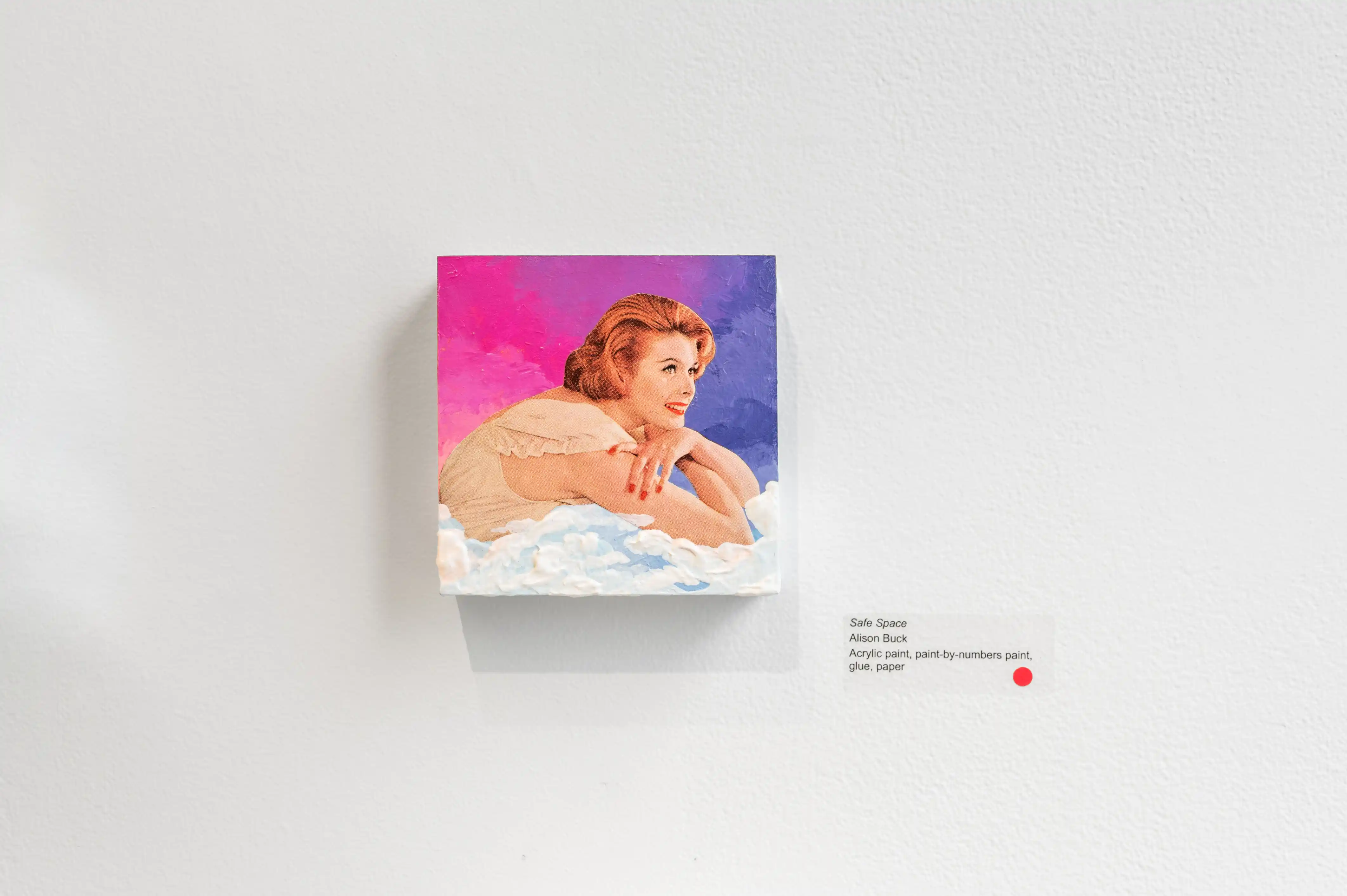 Gallery wall featuring a canvas print of a vintage-styled painting depicting a woman bathing, with a playfully alluring expression, against a vibrant pink and blue background.