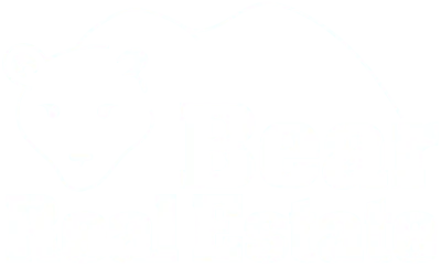 Logo of Bear Real Estate featuring stylized bear outline above company name.