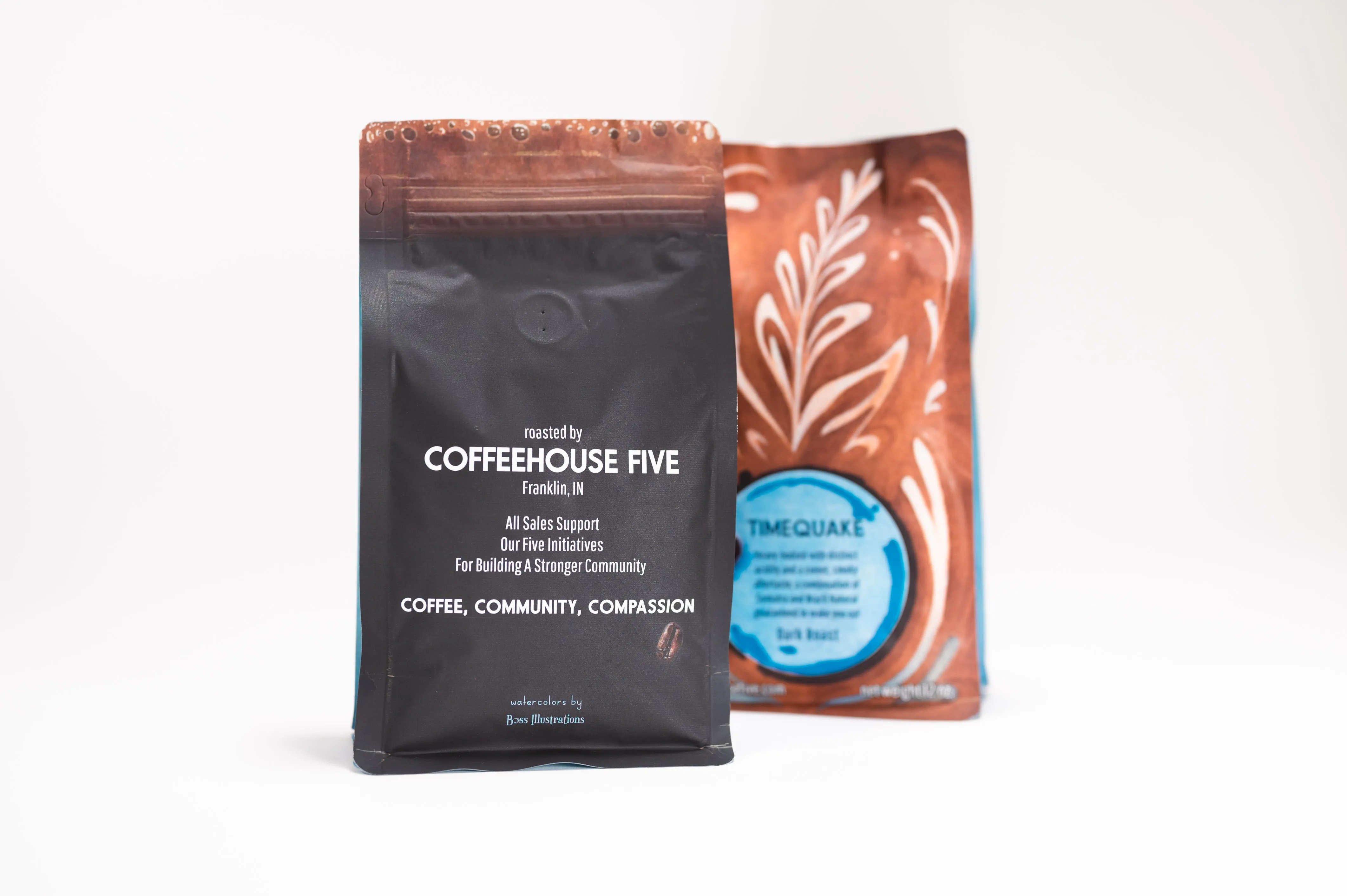 Two bags of coffee branded "COFFEEHOUSE FIVE" and "TIMEQUAKE" against a white background.