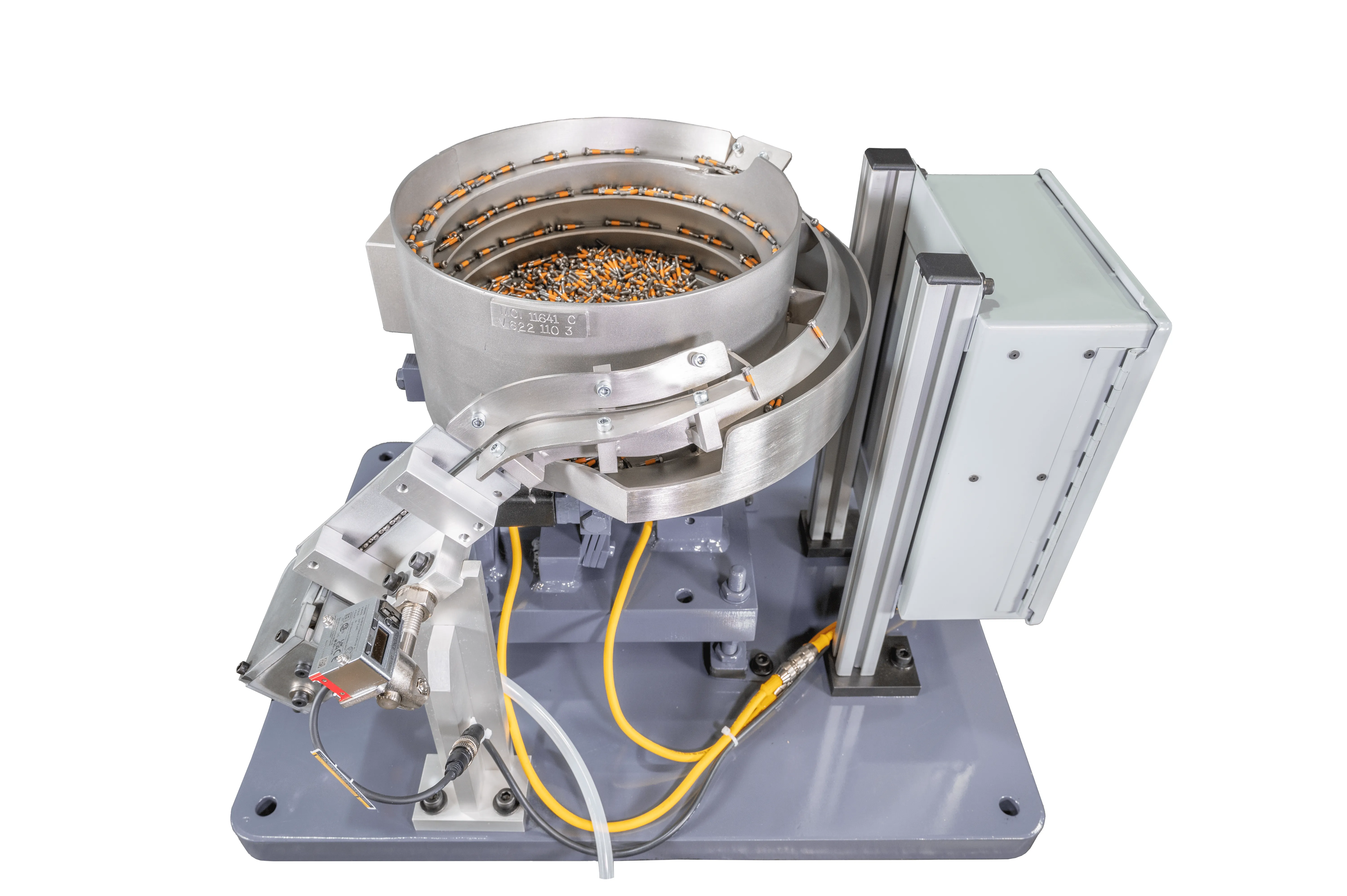 Industrial automated vibratory bowl feeder machine for sorting small parts.