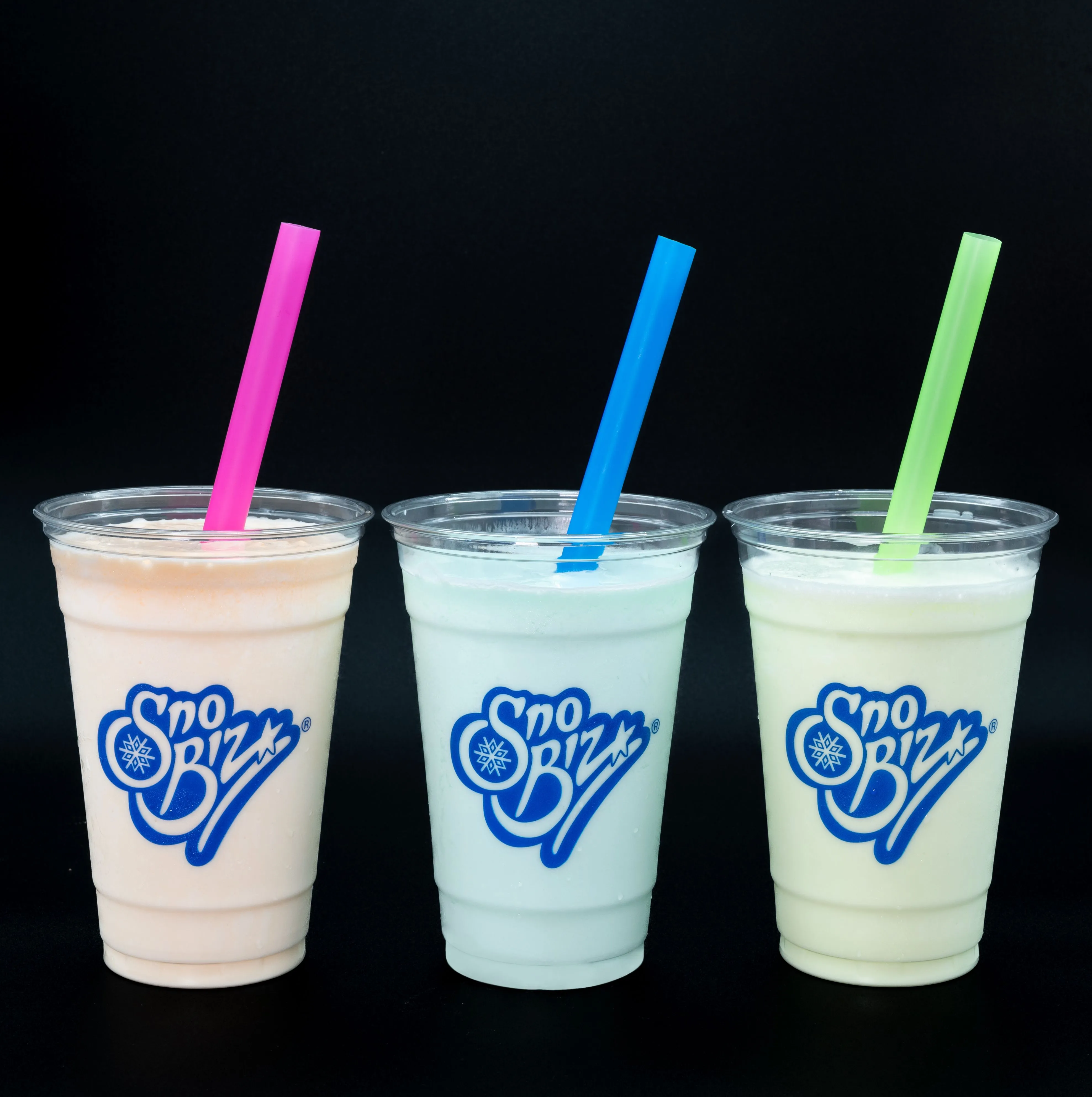 Three cups of frozen beverages with pink, blue, and green straws on a black background with "Sno Biz" logos.