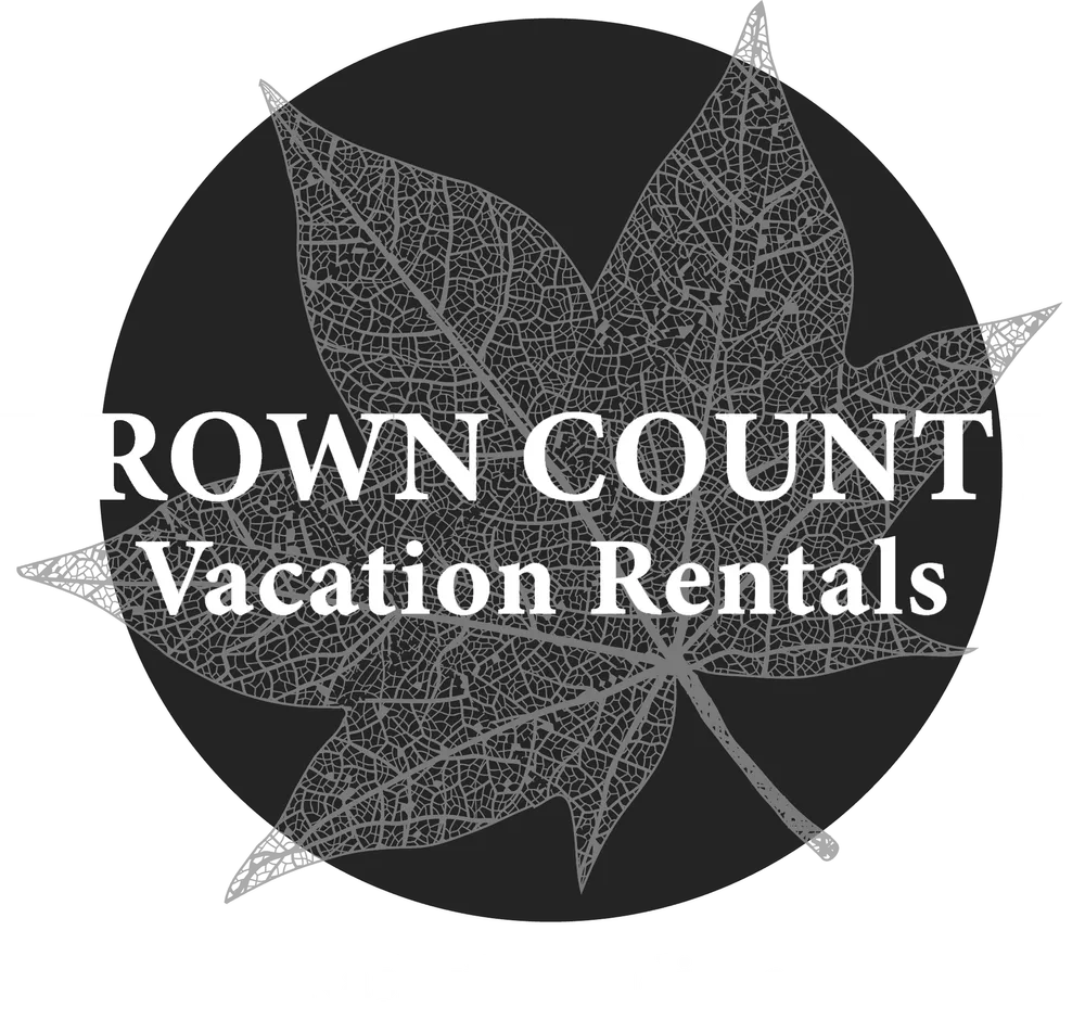 Logo of Brown County Vacation Rentals featuring a detailed leaf skeleton design on a dark circular background with text "Nashville, Indiana" below.