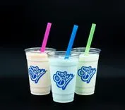 Three Sno Biz branded frozen drinks with pink, blue, and green straws against a black background.